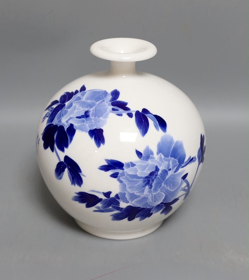 A Chinese blue and white vase, with inscription and impressed marks 17cm